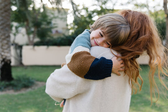 Mother and son outdoors 