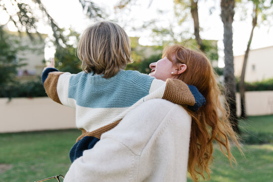Mother and son outdoors 