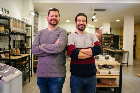 Happy Men Standing In Small Bussines