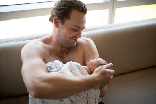 Father with newborn son 