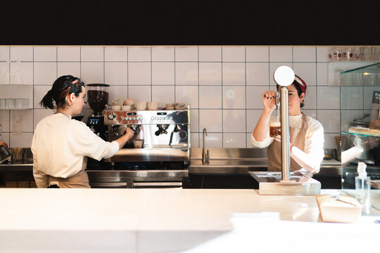 Bartender women working in bar