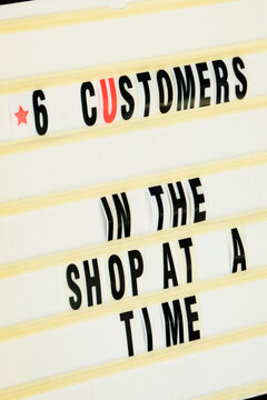 Customer advise outside at shop