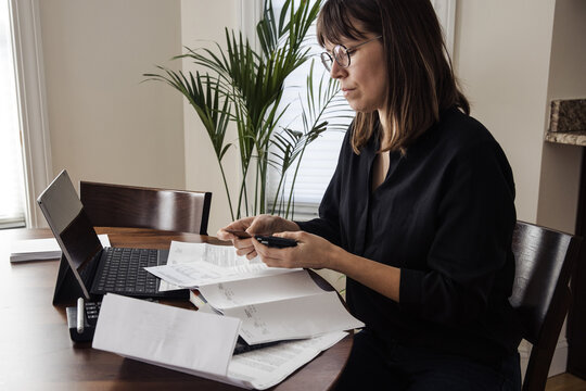 Woman uses credit card for online shopping