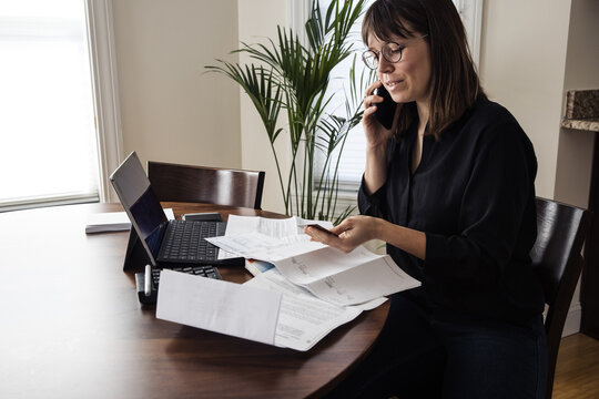 Woman uses credit card for online shopping