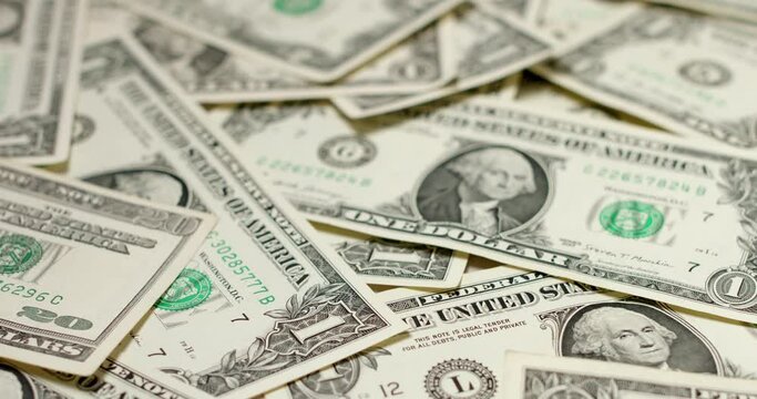 Pattern of One US Dollar bills. Money background, Dollar money currency. Panning over 1 USD bills to rare historic Silver certificate Dollar banknote