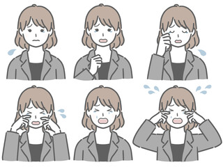泣く表情の強弱　スーツの若い女性