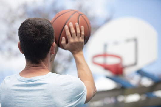 Male Basketball Player Making A Shot