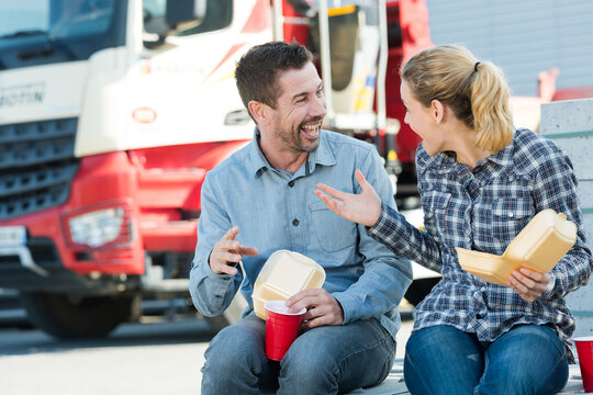 Warehouse Workers Having Lunch Break