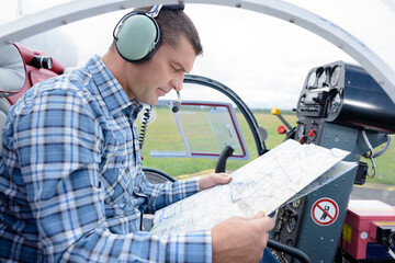 helicopter and pilot get ready to fly © auremar