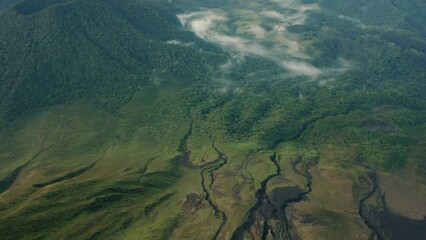 Costa Rica jungle on base of Arenal volcano, aerial, alluvial fans