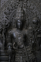 Stone Sculpture of  Hindu Gods with selective focus, 12th century Hindu temple, Ancient stone art and sculptures in each pillars, Chennakeshava Temple, Belur, Karnataka, India.