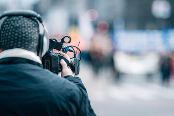 Camera Recording a Public Protest