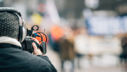 Television camera at the public protest, street demonstrations