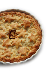 Apple Pie with double crust with cinnamon made with shortcrust pastry isolated on white background with star shape decoration
