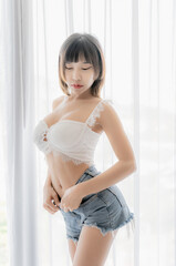 Beautiful portrait young asian woman sexy,posing looking sexy and attractive