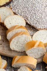 pieces of wheat baguette on a cutting board