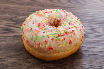 Sweet glazed vanilla donut with icing