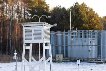 Weather monitoring station located in Granica, in Kampinos National Park. Picture taken in the winter afternoon. Natural soft light - obrazy, fototapety, plakaty