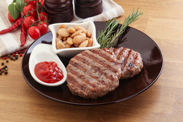 Grilled beef burger cutlet with sauce