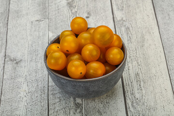 Fresh yellow cherry tomato heap