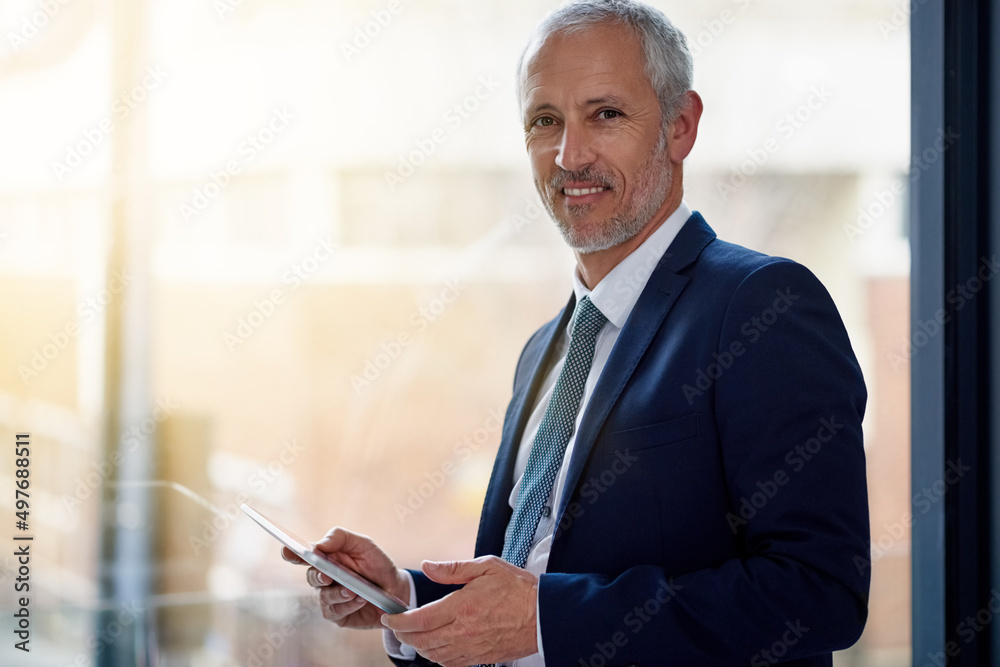 Aufkleber staying on top of digital corporate trends. portrait of a smiling mature businessman using a digital