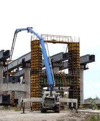 Concrete Mixer Truck With Pump System Under Bridge In Construction 
