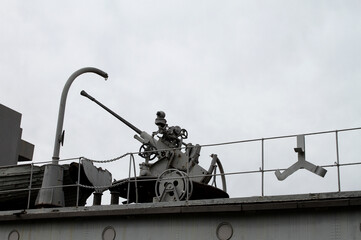 Soviet Heavy Gun On A Platform At Military Ship
