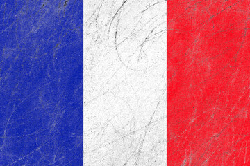 Rustic france flag on an old scratched concrete wall surface