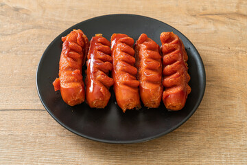 deep fried sausage skewer on plate