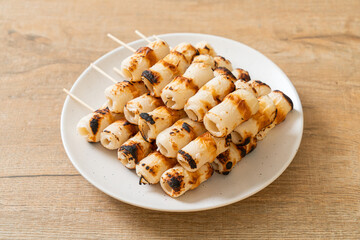 grilled tube shaped fish paste cake skewe or tube squid skewer