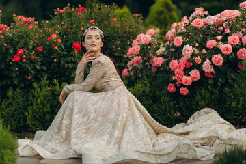 Portrait of a beautiful princess girl in the garden © Igor