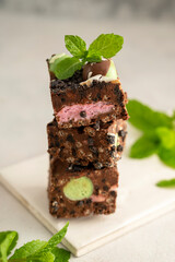 Bite sized chocolate and mint dessert, bite sized sweet cake dessert.