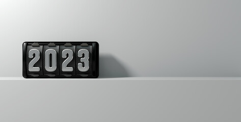 2023 text on a metallic grid