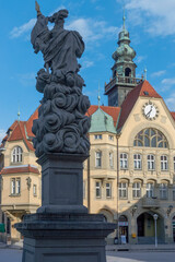 Fototapeta na wymiar Ptuj. Column with Florian' monument before Town hall