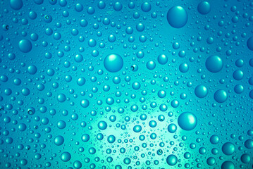  water drops over blue background.