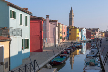 Fototapeta na wymiar Burano, Venezia. fondamenta and canal with reflected houses
