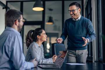 Business people, talking to each other, making new projects toge