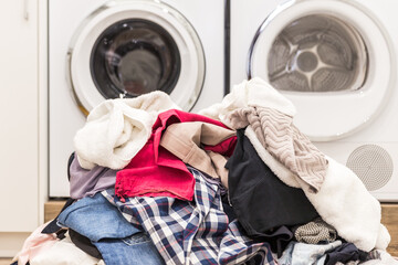 Laudry room with a pile of dirty clothes