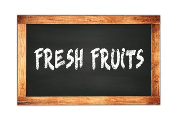 Obraz premium FRESH FRUITS text written on wooden frame school blackboard.