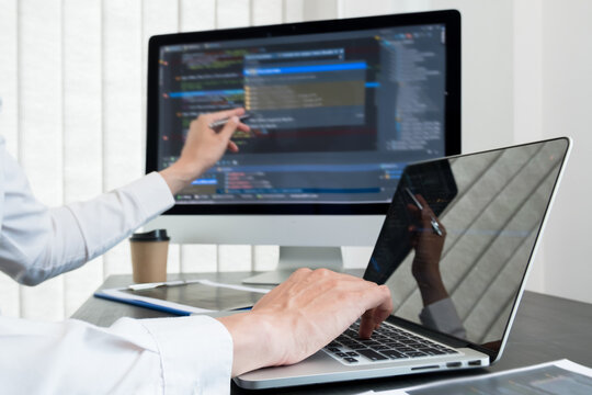 Programmer, Man working with computer programming, professional development, and coding technology, working on high-quality visual software development websites