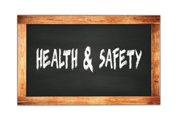 HEALTH  &  SAFETY text written on wooden frame school blackboard.