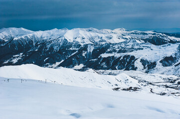 Fototapeta na wymiar Winter snowy mountains. Caucasus Mountains, Georgia, Gudauri.