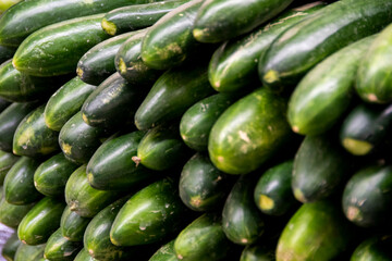fresh cucumber on market stall