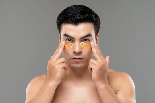 Beauty Shot Of Handsome Man Using Under Eye Mask Patches, Men Skin Care Concepts
