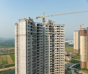 Fototapeta na wymiar Aerial view of multistory apartment construction site in China