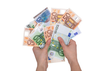 a bundle of euros of different denominations in the hands, isolated on a white background