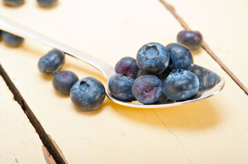 fresh blueberry on silver spoon