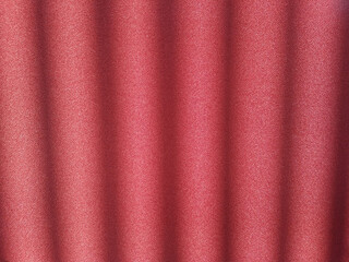 Texture of red burgundy curtain background.