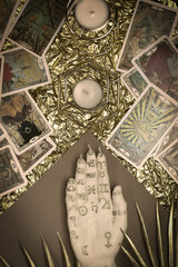 Tarot cards layout on witch table. Esoteric concept and astrology.