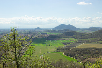 Hilly landscape. Trail on Monte Ceva. Aerial view of the Terme Euganee, Padua and the cultivated fields. Green spring landscape.